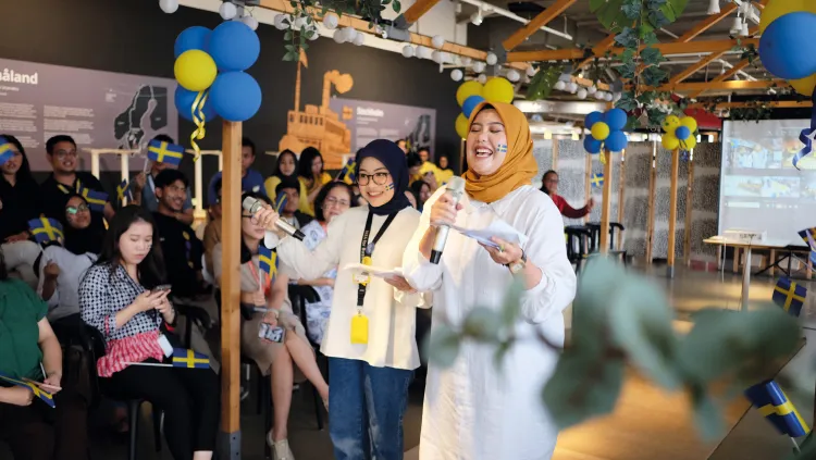 IKEA team members Rena Satya (L) and Arina Rahmatul (R) hosting IKEA’s 9th Anniversary Celebration in Indonesia at the Alam Sutera store